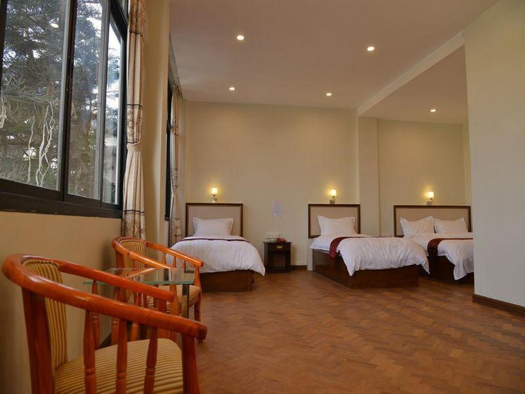 Hotel Myitkyinā Rum bild