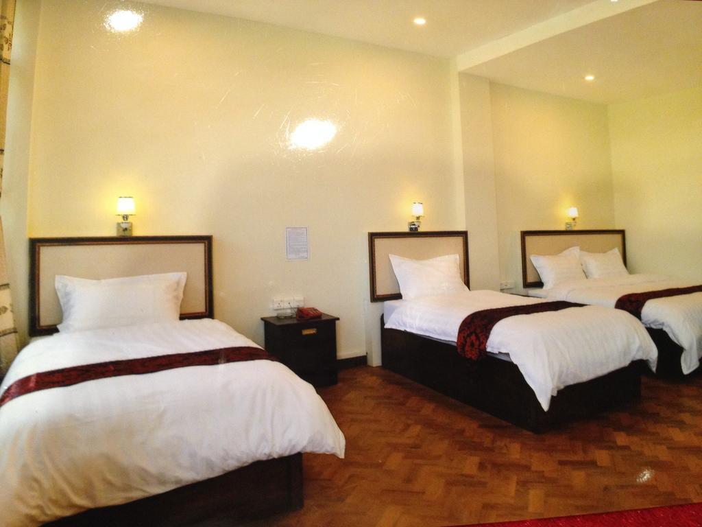 Hotel Myitkyinā Rum bild